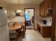 Cozy eat-in kitchen features a breakfast nook and access to another room at 1046 Waterside Se Dr, Conyers, GA 30013