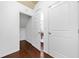 Hallway space featuring hardwood floors and convenient access to storage at 123 Meridian Dr, Woodstock, GA 30188