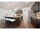 Spacious kitchen featuring granite countertops, a center island, and stainless steel appliances at 123 Meridian Dr, Woodstock, GA 30188