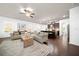 Spacious living room connected to kitchen, featuring modern decor and natural light at 123 Meridian Dr, Woodstock, GA 30188
