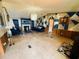 A spacious living room, featuring a charming fireplace and stylish, geometric design at 263 Gulfport Ct, Hampton, GA 30228