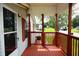 The porch features sturdy railings and an open view, blending outdoor living at 263 Gulfport Ct, Hampton, GA 30228