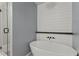 Contemporary bathroom with a standalone tub and modern fixtures creates a spa-like retreat at 4212 Burns Heritage Ne Trl, Roswell, GA 30075