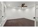 Bright bedroom featuring hardwood floors, recessed lighting, and a ceiling fan at 4212 Burns Heritage Ne Trl, Roswell, GA 30075