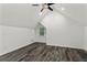 Bonus room with unique floors, fan, recessed lighting, and window at 4212 Burns Heritage Ne Trl, Roswell, GA 30075