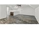 Spacious bonus room with distinctive floors, recessed lighting, and ample space for activities or storage at 4212 Burns Heritage Ne Trl, Roswell, GA 30075
