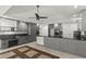 Spacious kitchen featuring sleek gray cabinets, modern appliances, and ample counter space at 4212 Burns Heritage Ne Trl, Roswell, GA 30075