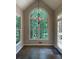 Bright breakfast nook with large windows providing scenic views, complemented by a modern chandelier at 1915 Habersham Trce, Cumming, GA 30041