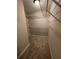 Walk-in closet is equipped with multiple shelves, maximizing storage and organization at 1915 Habersham Trce, Cumming, GA 30041