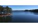 Expansive view of Lake Lanier, showcasing its tranquil waters and picturesque shoreline with islands at 1915 Habersham Trce, Cumming, GA 30041