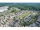 An elevated view of a residential community nestled among trees, featuring a community playground at 2013 White Cypress Ct, Smyrna, GA 30082