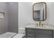 Well-appointed bathroom showcasing a modern vanity with elegant marble countertop at 2013 White Cypress Ct, Smyrna, GA 30082