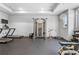 Well-equipped community gym featuring treadmills, weight machines, and ample space for a comprehensive workout at 2013 White Cypress Ct, Smyrna, GA 30082