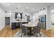 Stunning kitchen with a large island, stainless steel appliances, and a breakfast nook with seating at 2013 White Cypress Ct, Smyrna, GA 30082