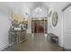 The clubhouse lobby offers an inviting ambiance with a chandelier, stylish furniture, and elegant decor elements at 2013 White Cypress Ct, Smyrna, GA 30082