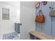 Mudroom features built-in bench and storage, creating an organized and functional space at 2013 White Cypress Ct, Smyrna, GA 30082