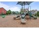 Community playground featuring slides, swings, and climbing structures, providing a fun and safe recreational area at 2013 White Cypress Ct, Smyrna, GA 30082