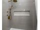 Sleek shower featuring modern fixtures and a decorative tiled niche at 2013 White Cypress Ct, Smyrna, GA 30082