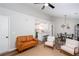 A bright living room with modern furnishings, neutral colors, and an open floor plan at 214 Chelsea Ct, Woodstock, GA 30189