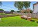 Large backyard featuring a well-manicured lawn and a swing at 1713 Paramore Ne, Marietta, GA 30062