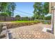 Backyard patio featuring a brick surround and well-manicured lawn at 1713 Paramore Ne, Marietta, GA 30062