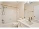 Bathroom featuring a bath tub shower combination and quartz countertops at 1713 Paramore Ne, Marietta, GA 30062