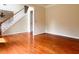 Living room with wood flooring, a staircase, and ample natural light at 1713 Paramore Ne, Marietta, GA 30062