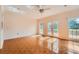 Bright sunroom features tile flooring, neutral walls, and glass panel doors that lead to the backyard at 1713 Paramore Ne, Marietta, GA 30062