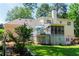 Lovely backyard featuring a deck with screened-in porch, perfect for outdoor entertaining and relaxation at 2050 Lyda Ln, Loganville, GA 30052
