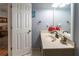 Bathroom featuring a vanity with sink, updated fixtures, and a decorative mirror at 2050 Lyda Ln, Loganville, GA 30052