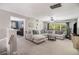 Cozy upstairs bonus room featuring a large sectional sofa and plenty of natural light at 3533 Aberdeen Way, Douglasville, GA 30135
