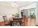 Charming dining room featuring a decorative table with seating for four and lots of natural light at 3533 Aberdeen Way, Douglasville, GA 30135
