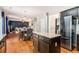 Modern kitchen with stainless steel appliances, dark cabinets, granite countertops, and an open layout at 3533 Aberdeen Way, Douglasville, GA 30135