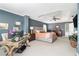 Spacious main bedroom featuring a sitting area, desk, and ample natural light at 3533 Aberdeen Way, Douglasville, GA 30135