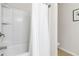 Bathroom featuring a bright white shower and tub with a shower curtain at 441 Spring View Dr, Woodstock, GA 30188