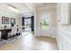 Welcoming entryway featuring tiled floors, a dining area, and lots of natural light at 441 Spring View Dr, Woodstock, GA 30188
