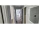 Hallway with hardwood floors and neutral paint at 70 Ruzelle Se Dr, Atlanta, GA 30354