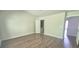 The bedroom features a vaulted ceiling, ceiling fan, and light wood flooring at 2061 Fosco Dr, Duluth, GA 30097