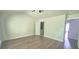 The bedroom features a vaulted ceiling, ceiling fan, and light wood flooring at 2061 Fosco Dr, Duluth, GA 30097