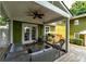 Inviting back patio with comfortable seating, a ceiling fan, and a grill for outdoor relaxation and entertaining at 3778 Berdon Ln, Decatur, GA 30034
