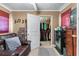 Cozy bedroom features a plush couch, a closet with lots of storage, and shelving at 3778 Berdon Ln, Decatur, GA 30034