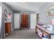 Neutral bedroom features storage, carpeted floors, and natural light at 3778 Berdon Ln, Decatur, GA 30034