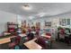 Large classroom area with many desks, natural lighting and an open floor plan at 3778 Berdon Ln, Decatur, GA 30034
