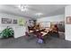 Spacious classroom boasts ample natural light, ceiling fan, and desks for collaborative learning at 3778 Berdon Ln, Decatur, GA 30034