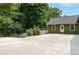 Large driveway provides ample parking space with convenient access to the home's entrance at 3778 Berdon Ln, Decatur, GA 30034