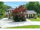 Beautiful home exterior with a well-manicured lawn and inviting curb appeal at 3778 Berdon Ln, Decatur, GA 30034