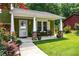 Inviting front porch with seating, great for relaxing and enjoying the outdoors at 3778 Berdon Ln, Decatur, GA 30034