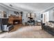 Spacious living room with brick fireplace, tile floors, gray walls, and natural lighting at 3778 Berdon Ln, Decatur, GA 30034