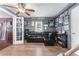 Finished basement space with wood flooring, a sofa, and sports memorabilia displayed at 3778 Berdon Ln, Decatur, GA 30034