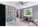 Inviting sunroom features neutral walls, tile floor, and a functional built-in wine rack and cabinet at 3778 Berdon Ln, Decatur, GA 30034